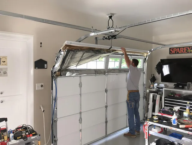 Garage door section replacement by New Franklin Garage Door Repair in New Franklin