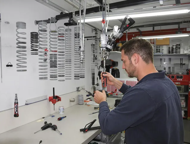 New Franklin Garage Door Repair safety certified technician performing precision spring replacement in New Franklin