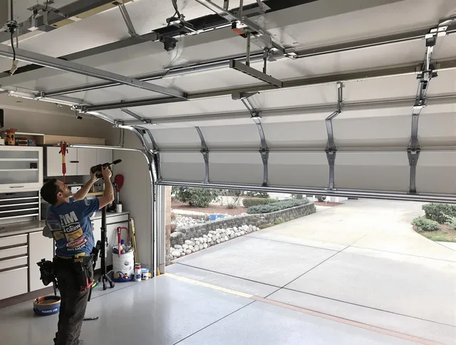 Garage door track repair service by New Franklin Garage Door Repair in New Franklin